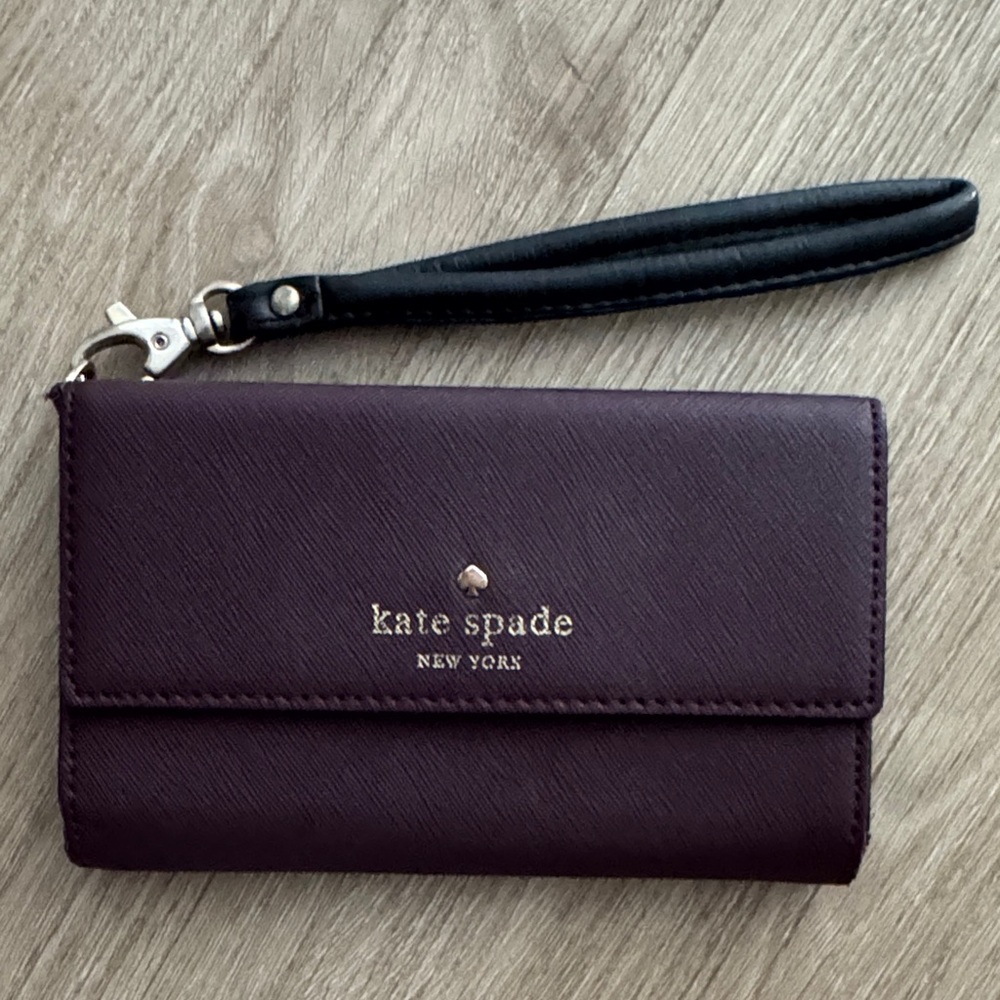 kate spade plum wristlet wallet with black strap